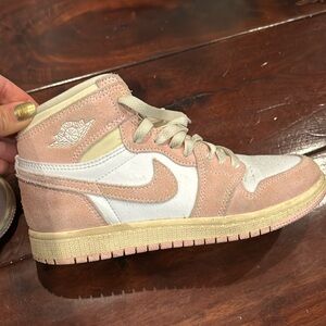 Nike air Jordans with pink trim